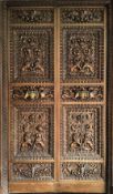 A pair of French 19th century Napoleon III style Chateau internal carved walnut double doors