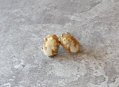 A pair of 9ct gold mounted cameo earrings 2.61g gross
