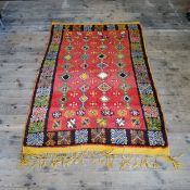 Interior Design - A Mid 20th century Moroccan Tazenakht hand knotted woolen rug