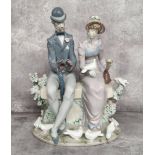 A Lladro porcelain 'A Quiet Afternoon' figure group printed marks, no. 5843, 32cm high