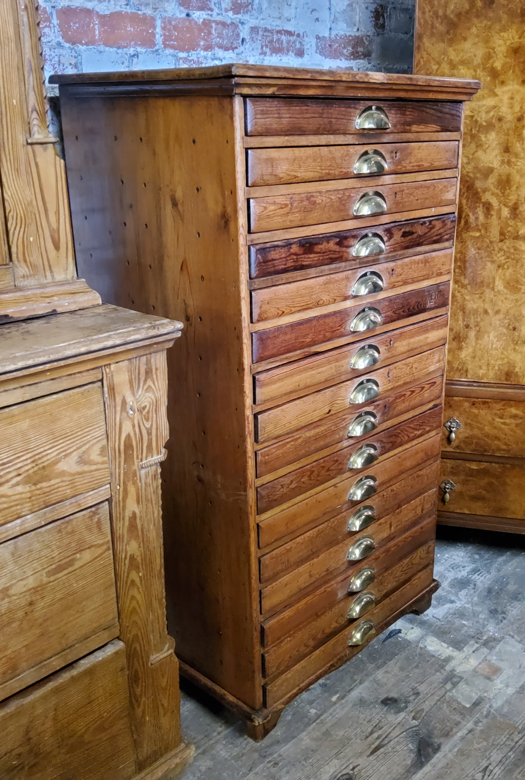 A late 19th century farmhouse pine bank of sixteen collectors drawers / printers drawers with - Image 3 of 3