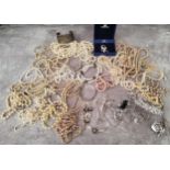 A box of natural pearl necklaces; faux pearl necklaces; Swarovski jewellery; and other jewellery