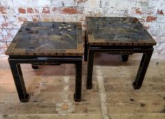A pair of 20th century black lacquered hand painted Japanese occasional tables, decorated with