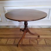 George III tilt top occasional table, a marriage of period oak top with mahogany legs, with later