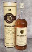 A bottle of AUCHENTOSHAN 10 year triple distilled Lowland single malt Scotch whisky, distilled and