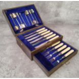 A cased silver plate high tea set for six comprising tea spoons, sugar nips, butter knifes & cake