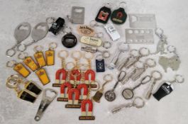 Various brewery novelty key rings including Guinness, John Smiths, Bells Whisky, Courage, Rico,