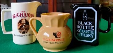 Whisky Advertisement - A Glenmorangie scotch whisky water jug; Black Bottle scotch whisky water