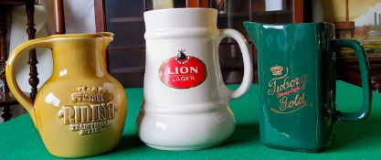 A Tuborg Gold Strong Lager water jug; Lion Lager water jug and Traditional Bitter water jug (3)