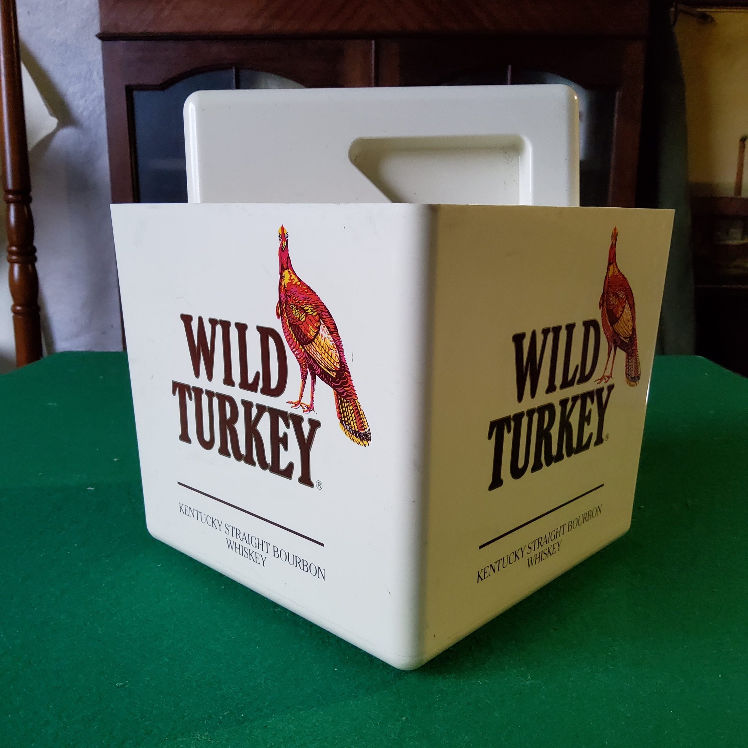 A Wild Turkey Kentucky straight bourbon whiskey ice bucket in excellent condition.