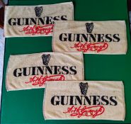 Four vintage Guinness bar towels.