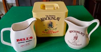 The Mackinlay Finest Old Scotch Whisky ice bucket; Mackinlay whisky water jug by Seton Pottery; a