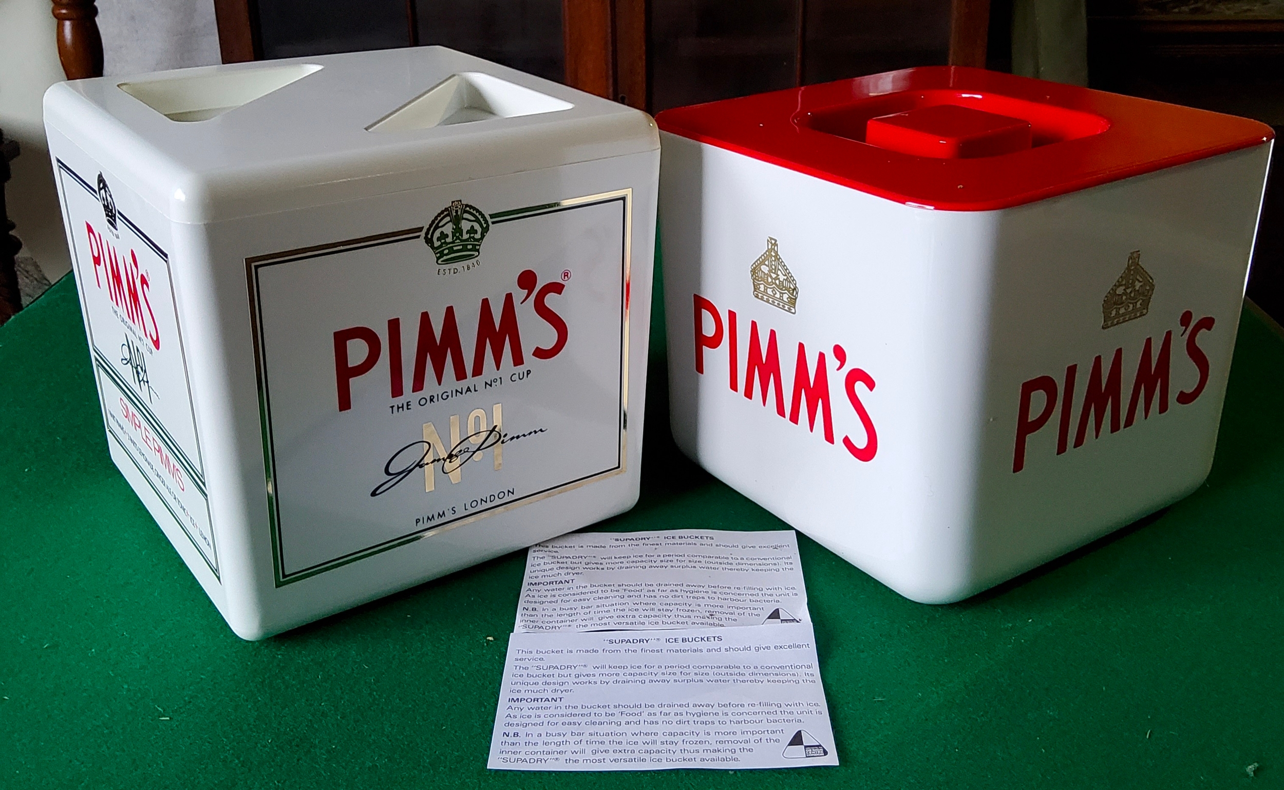 Pimm's O'Clock! Two Pimm's ice buckets in MINT condition.