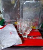 Coca-Cola related advertisement including a promotional T-shirt; Schweppes & Coca-Cola perspex