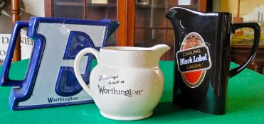 A novelty Worthingtons 'E' shaped water jug, another titled 'I Always Have A Worthingtons' jug and a