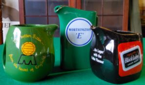 A Worthington 'E' whisky water jug by Wade PDM; Carling Black Label jug by Wade; a Mansfield Brewery