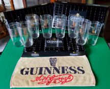 Guinness Advertising - Eight pint glasses; Three MINT condition drip trays and a vintage Guinness