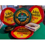 Breweriana - John Smith's advertising serving trays and ashtrays (7) Excellent Condition.