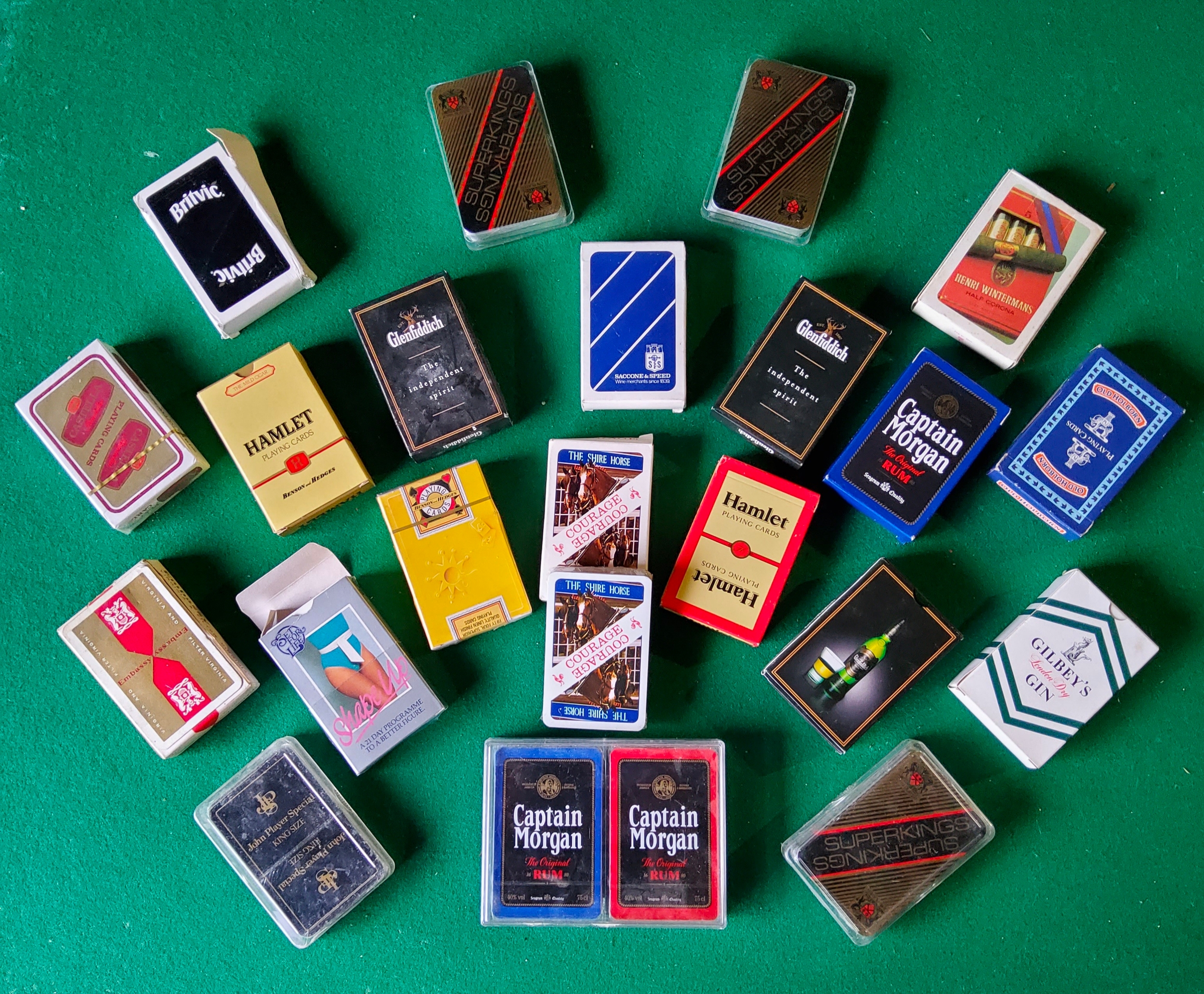 Advertisement - A collection of mostly mint condition playing card decks advertising Glenfiddich,