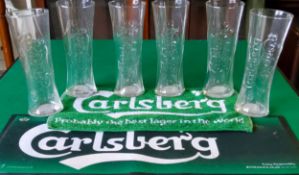 Carlsberg related beer mats and pint glasses.