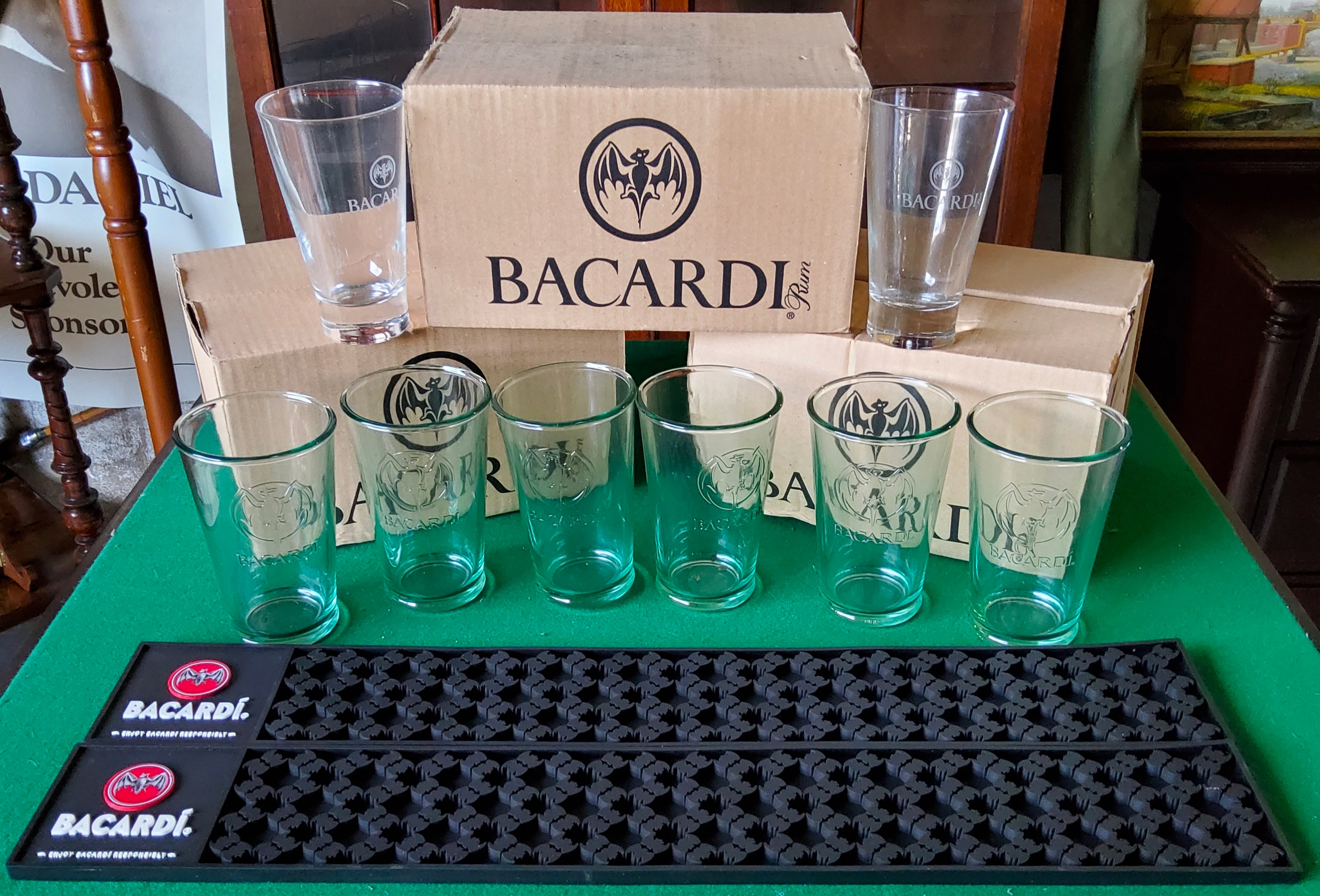 Bacardi related glasses and bar top drip mats. Excellent Condition.