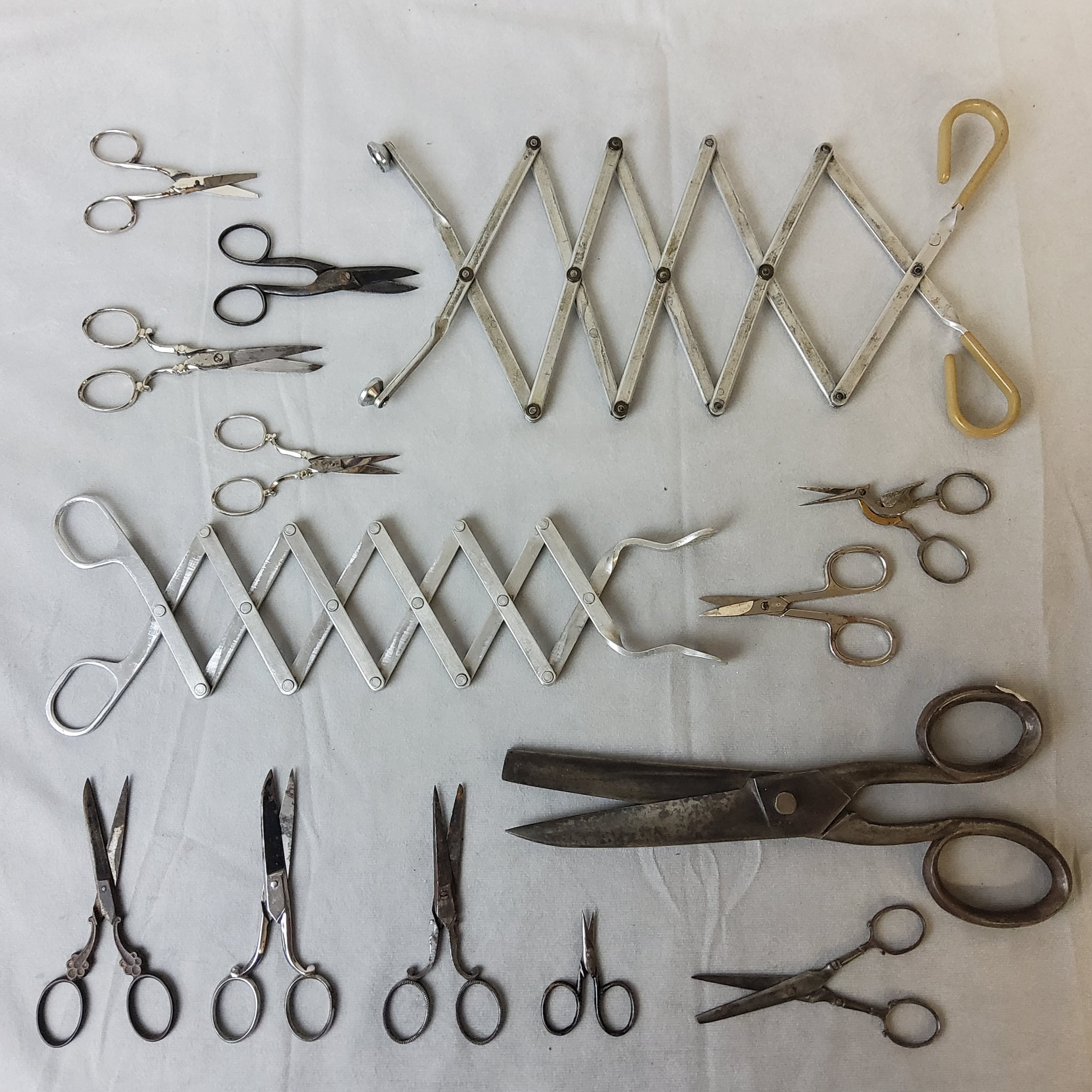 A collection of scissors including a 19th century Joseph Gillott example; embroidery scissors in