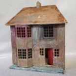 Interior Design - an early / mid 20th century tinplate and wooden dolls house. 54cm high