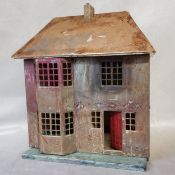 Interior Design - an early / mid 20th century tinplate and wooden dolls house. 54cm high