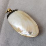 A 19th century Continental mother of pearl scent flask, horn tipped with gilt metal stopper and