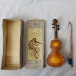 A scarce Toyodaya Co. Tokyo, tinplate violin complete with bow, in original box