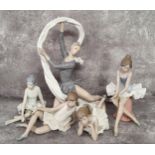 A Nao figure, of a ballerina with ribbon, 34cm high, a ballerina seated; other ballerinas