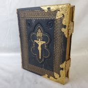 An early 20th century Moroccan leather family bible with gilt metal mounts for the Small family Of
