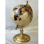 A semi precious stone and abalone inlaid terrestrial globe, gilt metal base. 42cm high