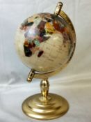 A semi precious stone and abalone inlaid terrestrial globe, gilt metal base. 42cm high