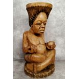 Tribal - a substantial African offertory bowl carved as a seated woman, she sits 45cm high