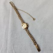A lady's 9ct gold Accurist cocktail watch (10.8g with mechanism and glass removed)