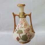 A Royal Worcester two handled ovoid vase, printed and painted with flowers on a blush ivory