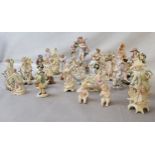 A collection of 19th century German and Continental porcelain and bisque porcelain fairlings,