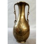Oriental - a Meiji period bronze twin handled vase with lotus leaf opening, stylised handles and