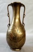 Oriental - a Meiji period bronze twin handled vase with lotus leaf opening, stylised handles and