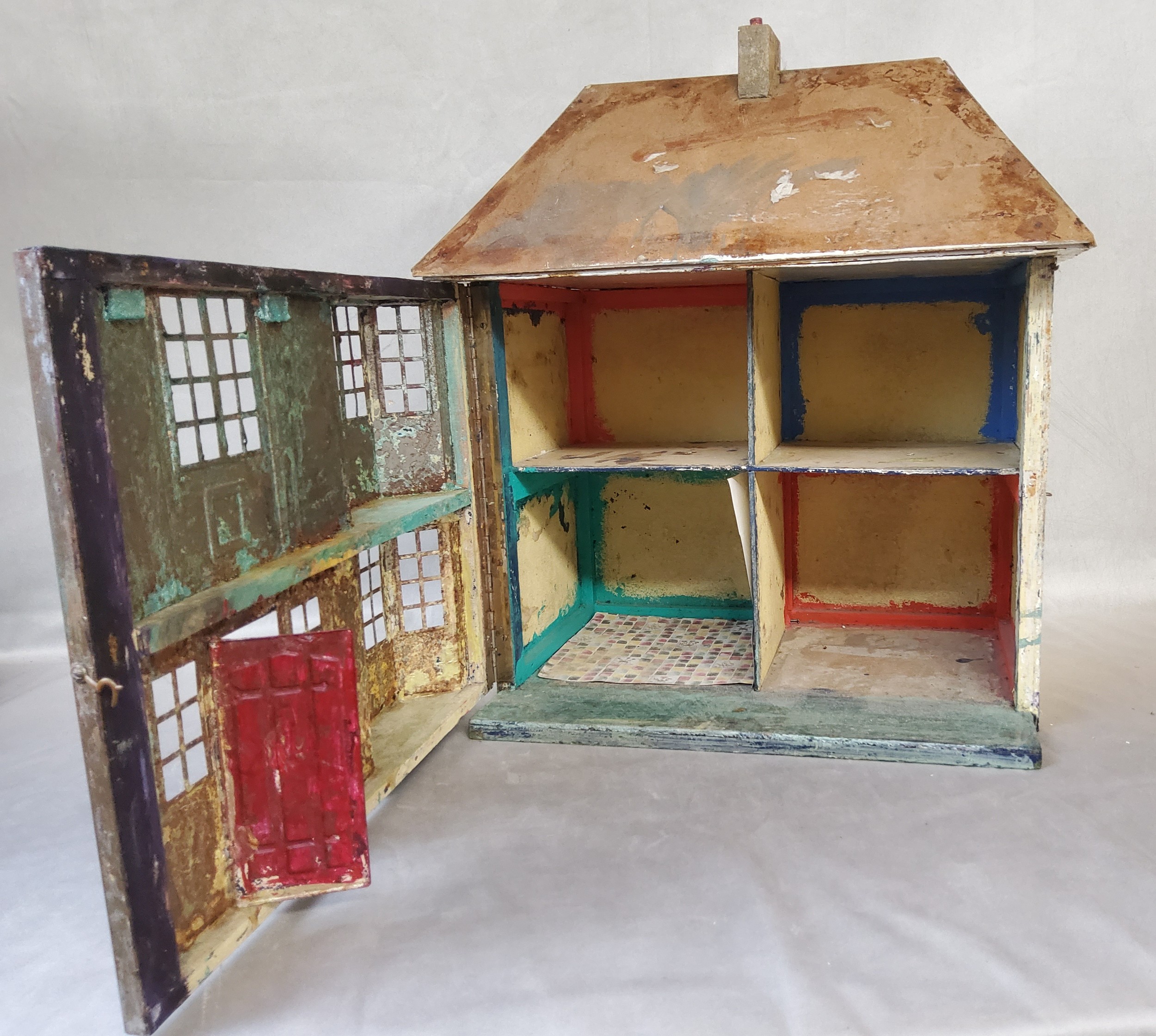 Interior Design - an early / mid 20th century tinplate and wooden dolls house. 54cm high - Image 3 of 3