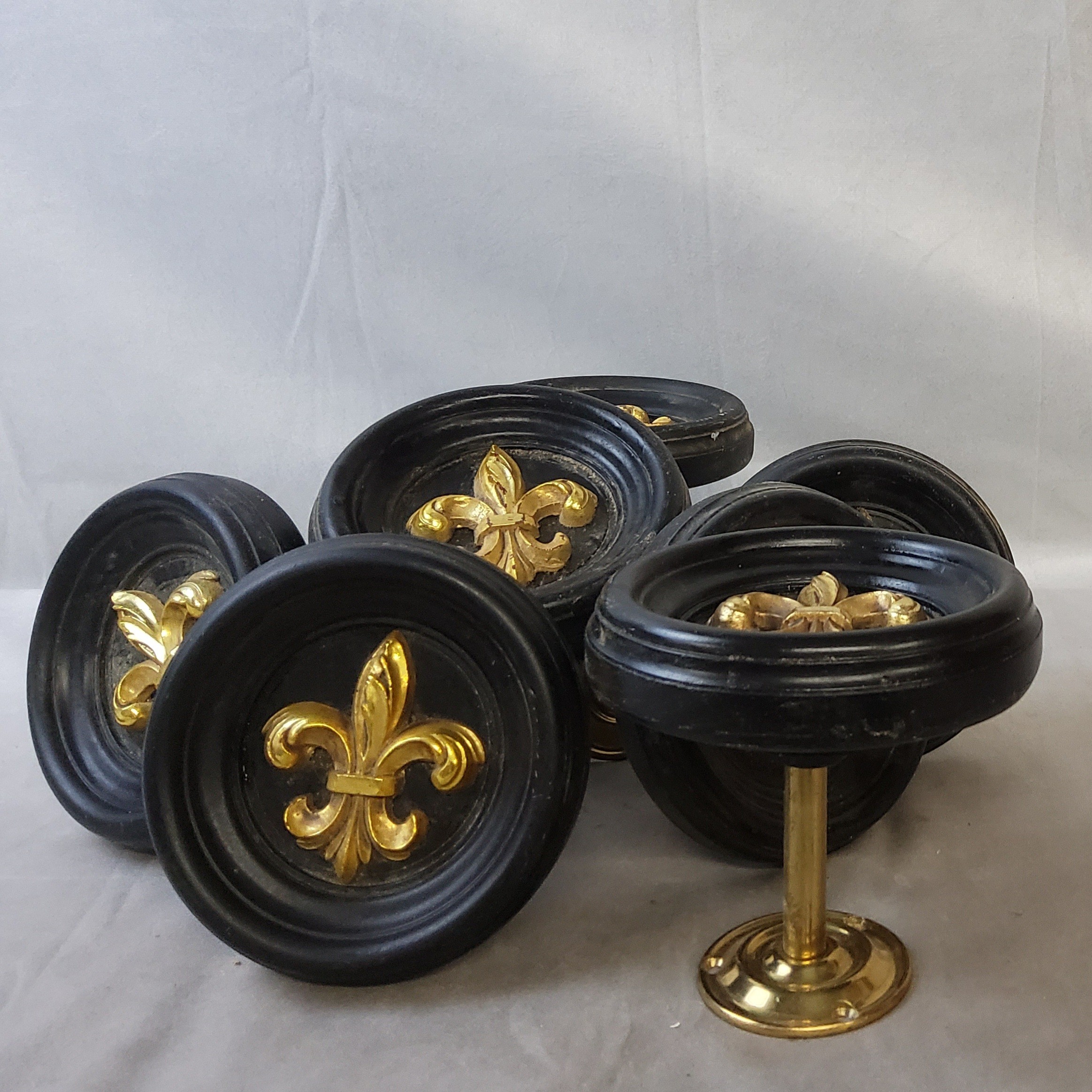 A set of seven country house ebony gilt metal mounted curtain tiebacks / holdback bosses (7) Dia