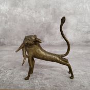 A Benin bronze lion