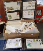 Philately - a large collection of first day covers including a Stanley Gibbons The collector's world