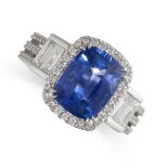 A SAPPHIRE AND DIAMOND RING in 18ct white gold, set with a cushion cut blue sapphire of 4.17 carats,