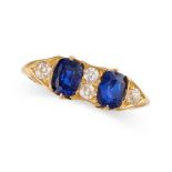 AN ANTIQUE SAPPHIRE AND DIAMOND DRESS RING in 18ct yellow gold, set with a two cushion cut blue