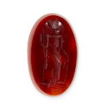 AN UNMOUNTED CARNELIAN INTAGLIO carved to depict a classical figure, 7.11 carats, 2.0cm.