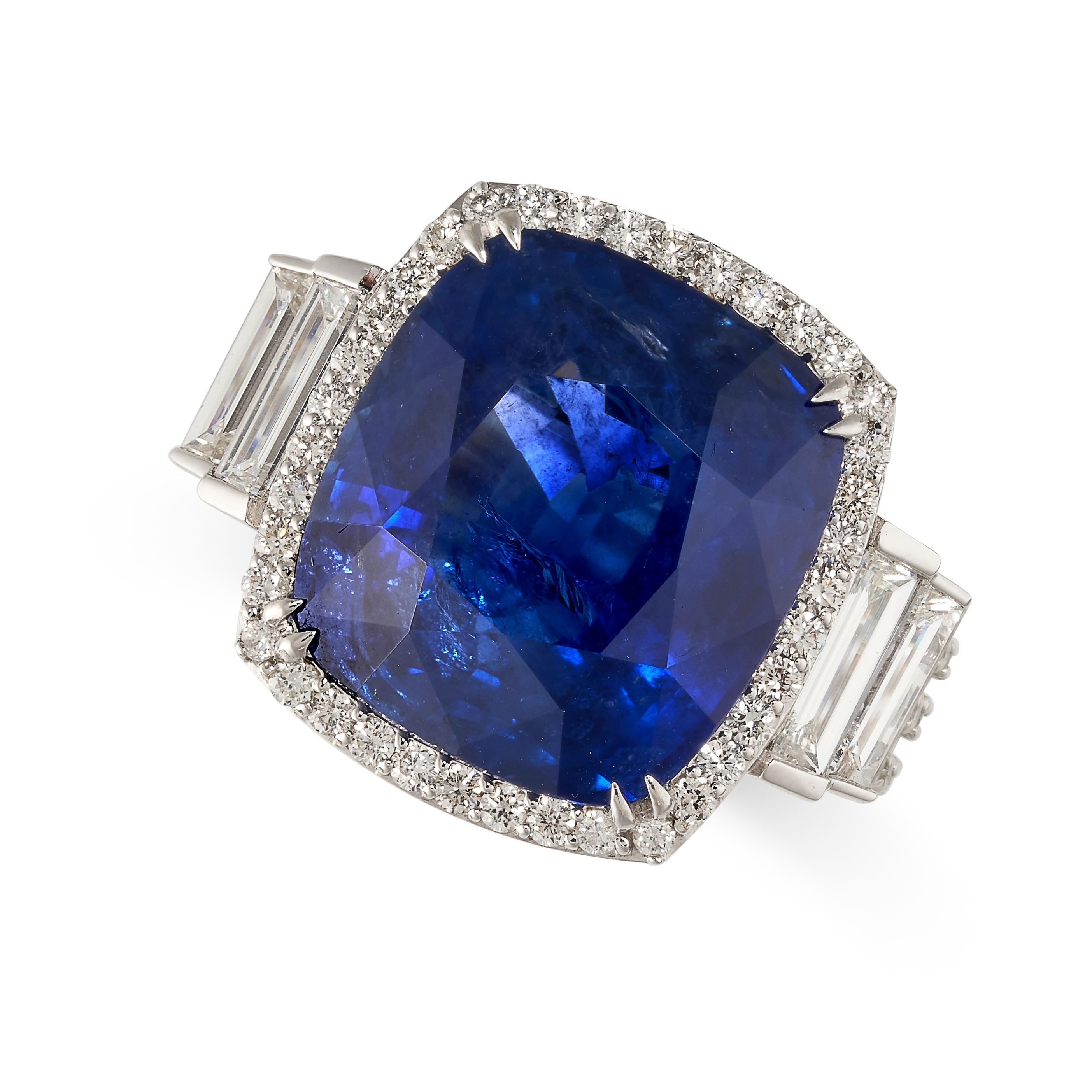 A LARGE SAPPHIRE AND DIAMOND RING in 18ct white gold, set with a cushion cut blue sapphire of 14.