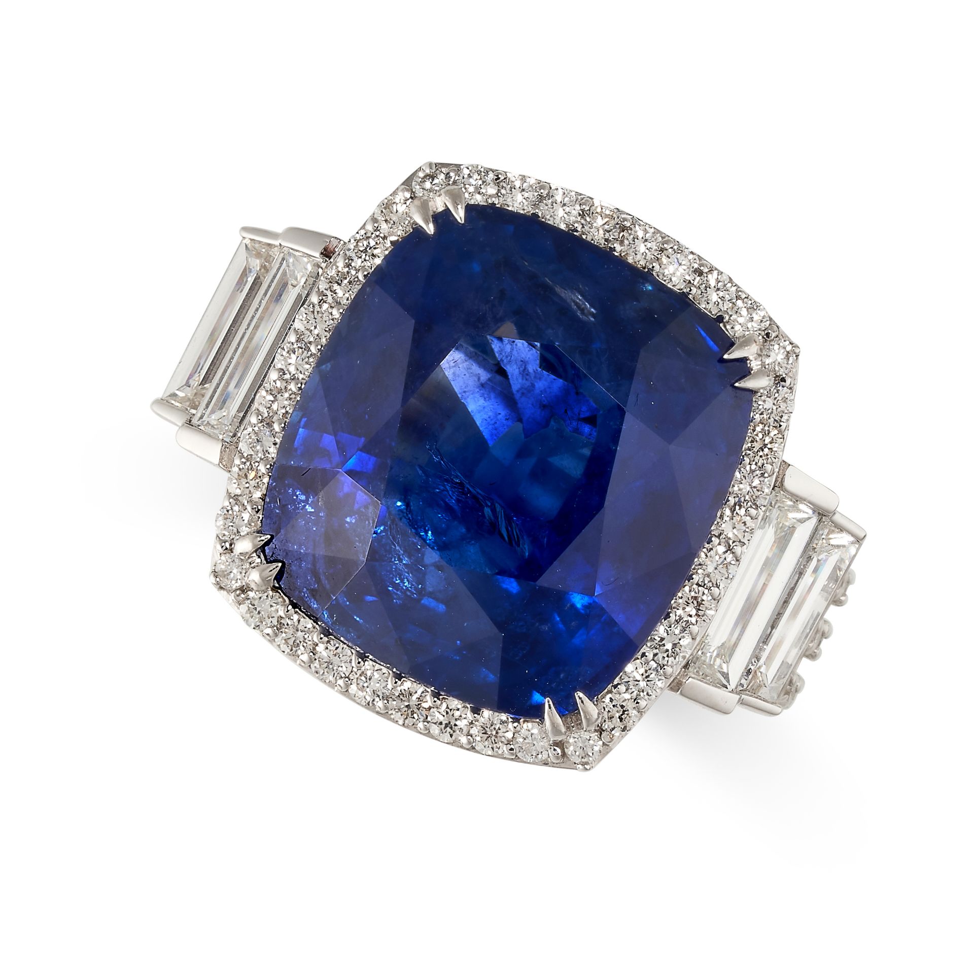 A LARGE SAPPHIRE AND DIAMOND RING in 18ct white gold, set with a cushion cut blue sapphire of 14.