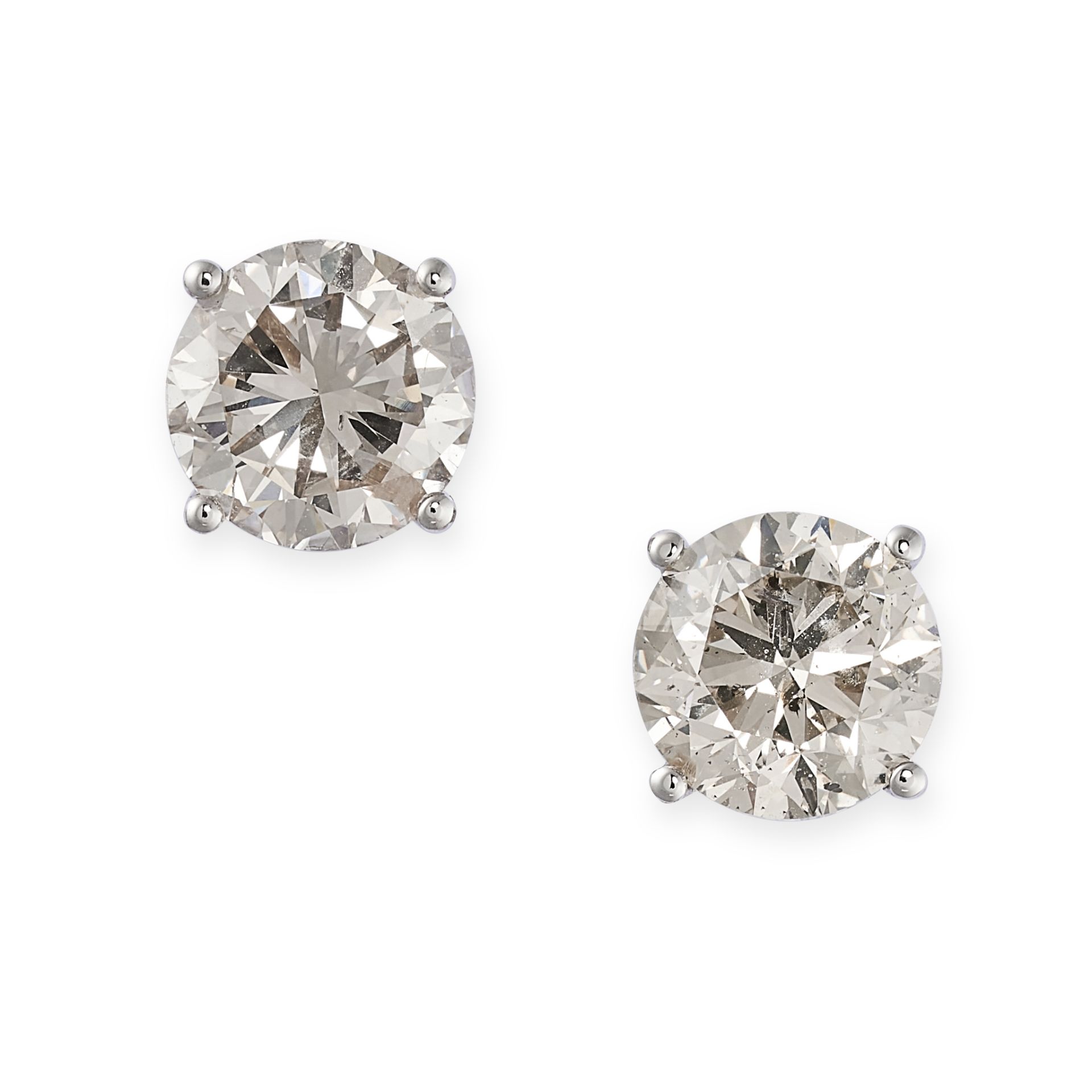 A PAIR OF SOLITAIRE DIAMOND STUD EARRINGS in 18ct white gold, each set with a round brilliant cut